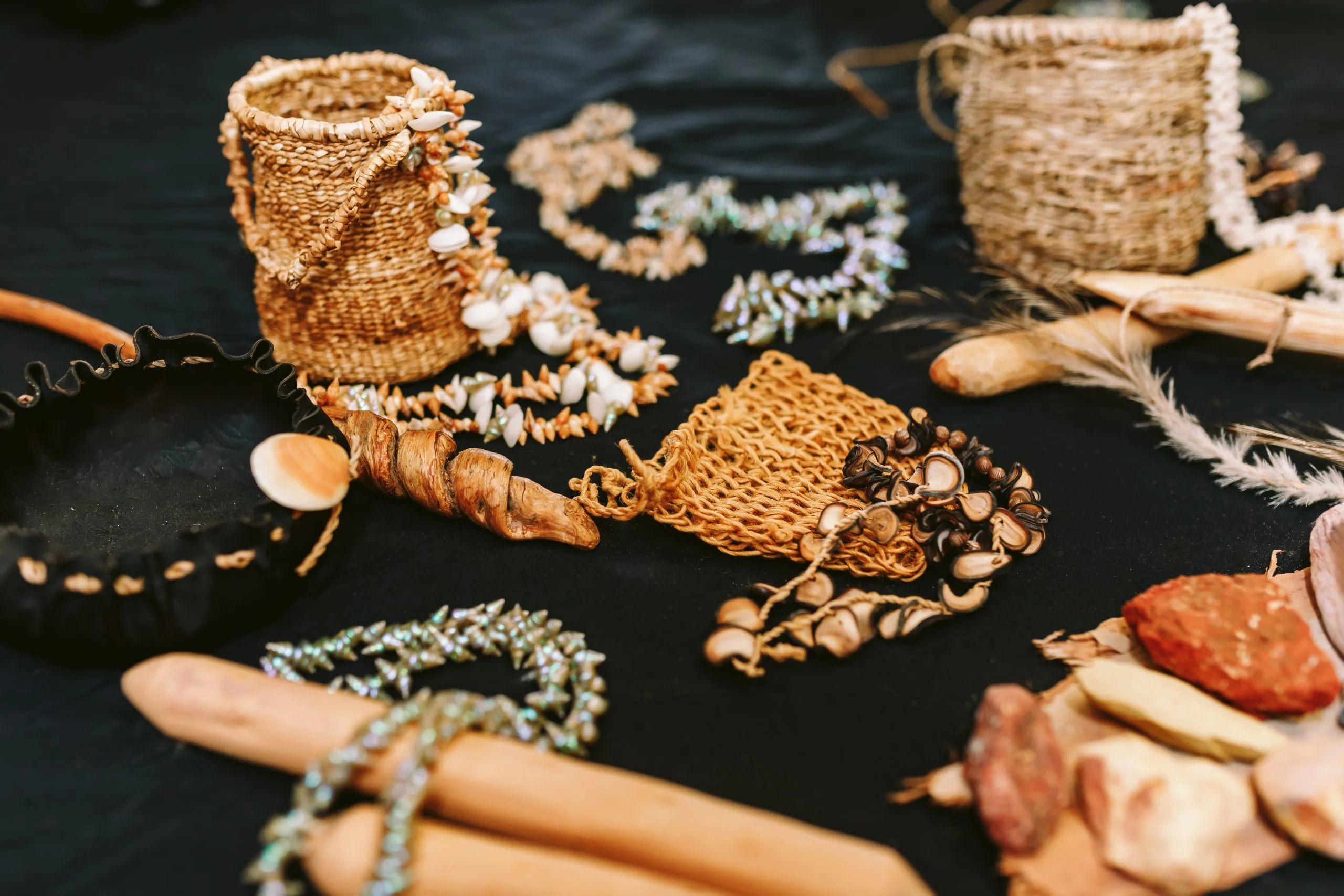 A selection of locally made Tasmanian Aboriginal artefacts and jewellery.